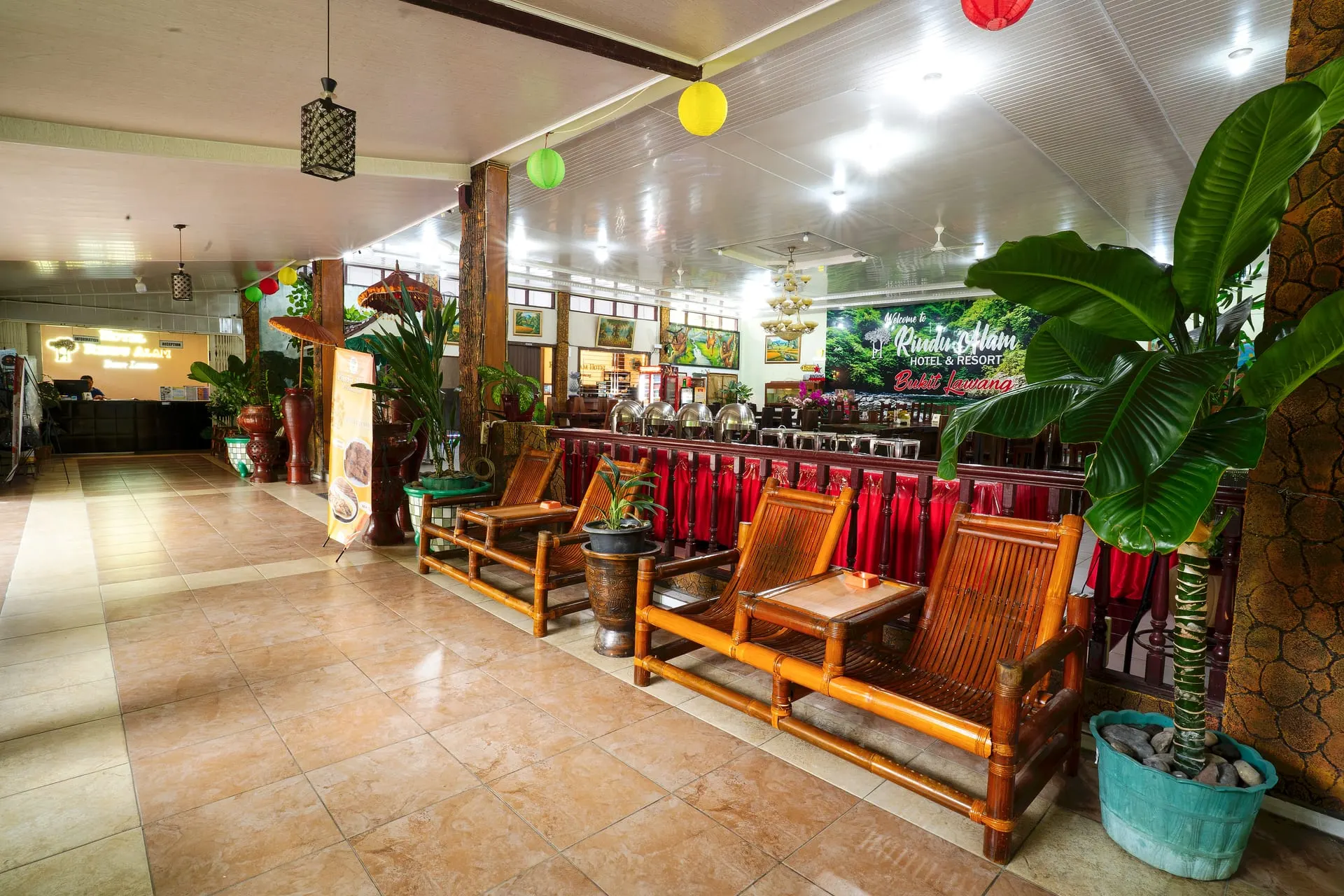 Restaurant lounge with wooden benches and plants