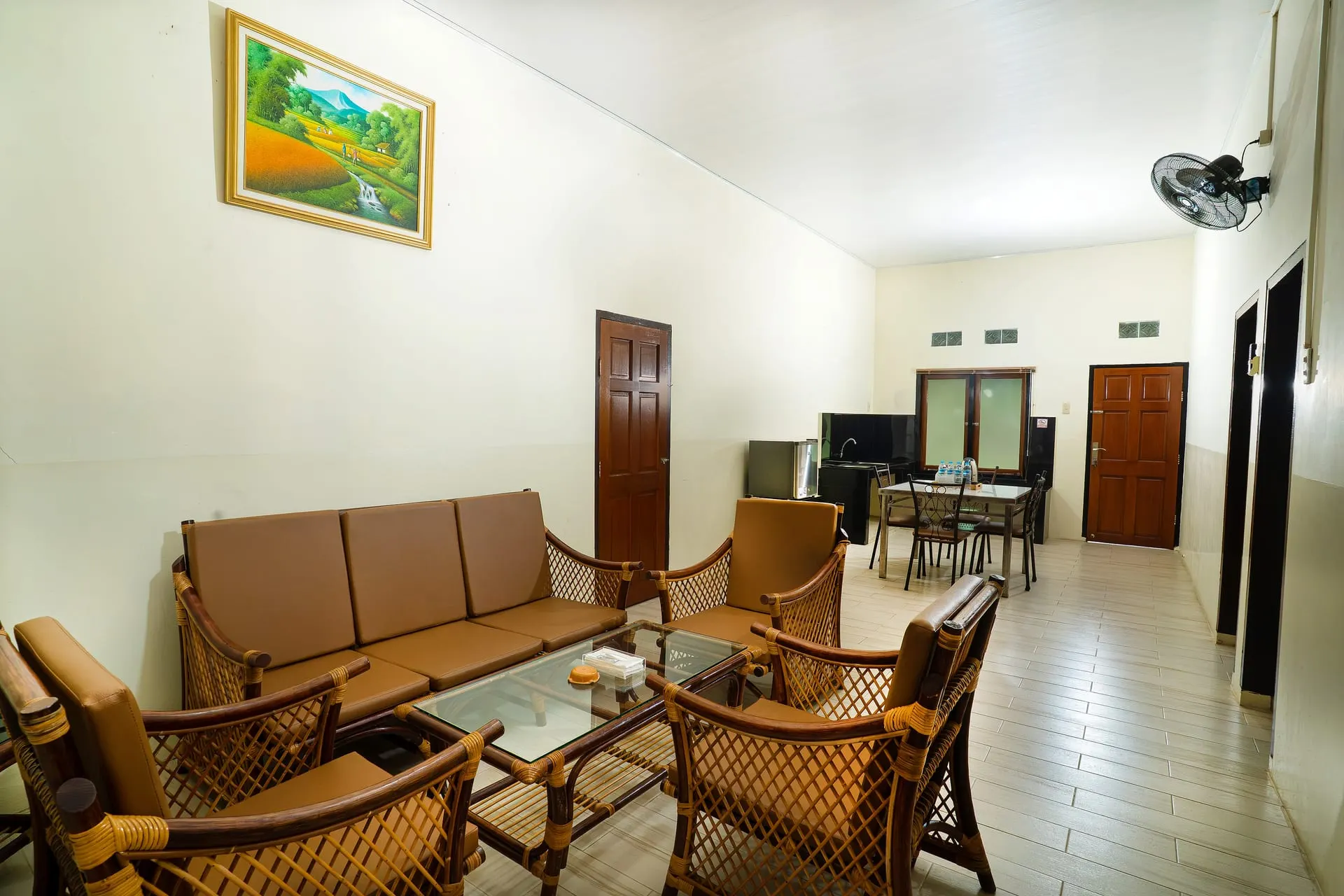 Family Suite living area with rattan sofa set